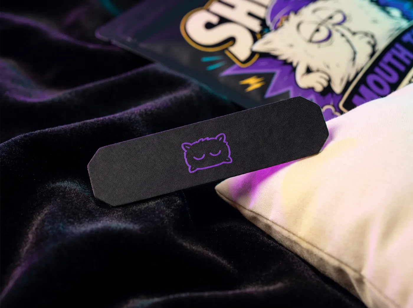Macro concept of the soft black SHHH! tape on pillow fabric